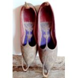 A pair of Early 20th Century Malaysian leather shoes.