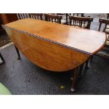 A Georgian mahogany gateleg table having two fall flaps and on pad shaped feet, 72h x 166w