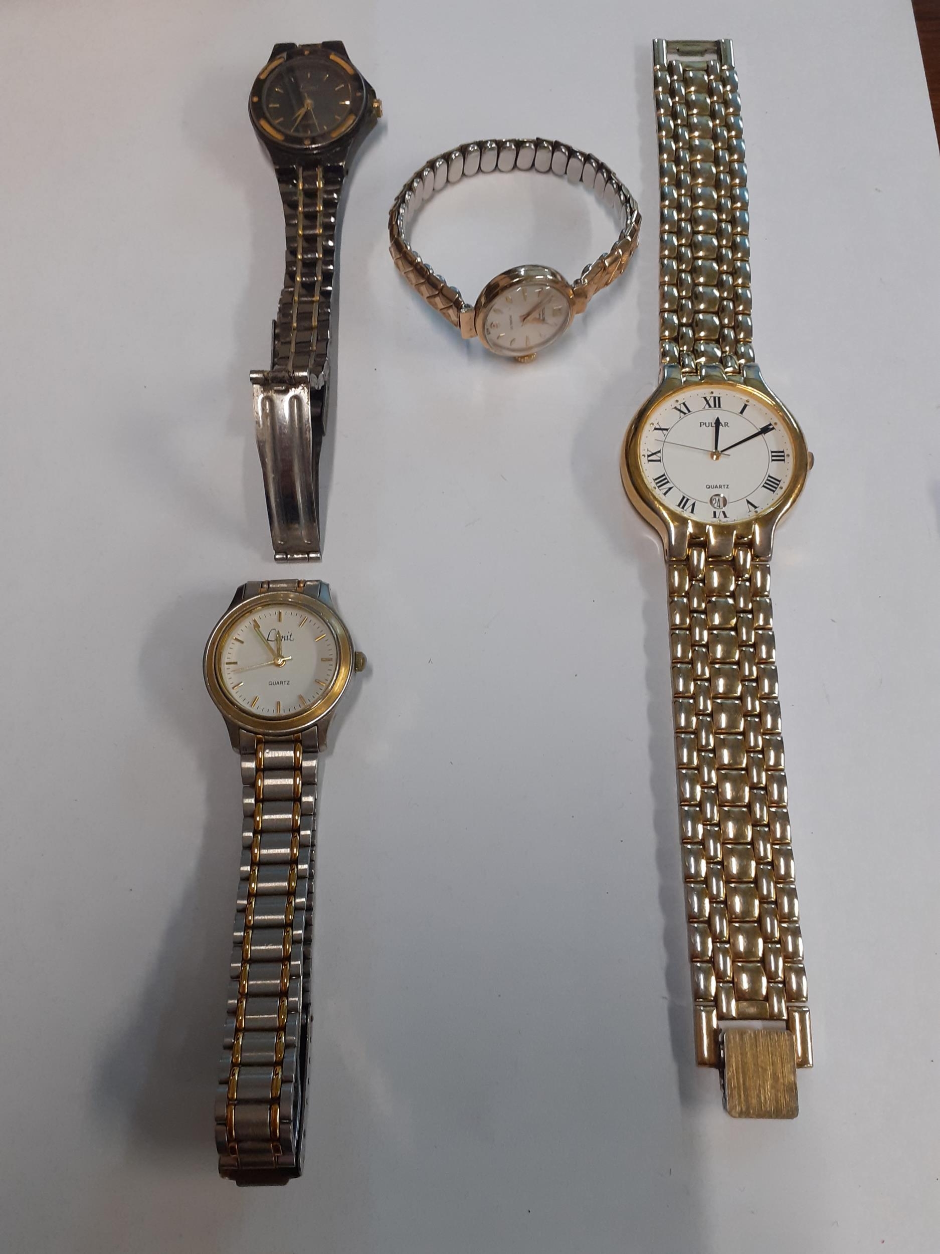 A yellow metal cased ladies Excalibur cocktail watch together with 3 other watches, all modern.