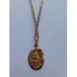 A 10ct gold chain having a 10ct gold St Christopher pendant, 4.0g