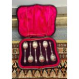 A cased set of six silver apostle spoons Location: Port