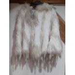 Maclauren-A white and cream short and long haired rabbit fur hooded poncho with cream leather