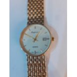 A gents 9ct gold watch, Emperor Quartz, total weight 36.2g, having a cream coloured dial Location: