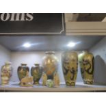 A group of Japanese and Chinese vases and soapstone carvings to include a pair of cloisonne vases,