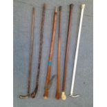 A silver topped walking cane A/F and five others to include a Classic Canes Winston Churchill