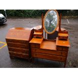 An early 20th century oak dressing table, together with a yew wood bureau