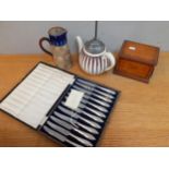 A set of twelve silver handled butter knives, makers mark JD & S, together with an oak box A/F, a