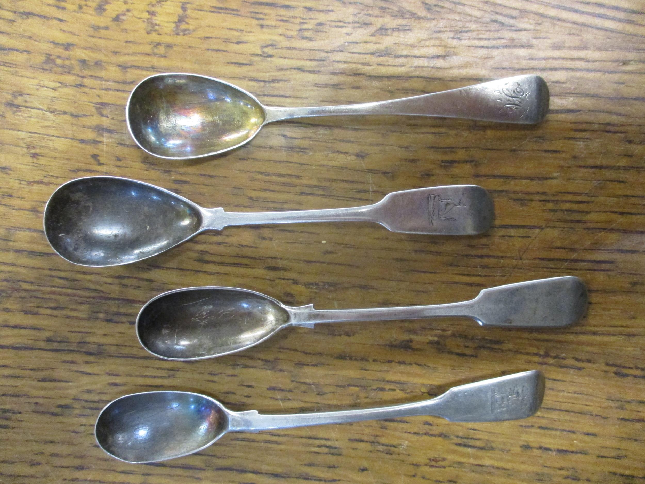 Three Georgian and one Victorian silver mustard spoons, various makers and dates, total weight, 53.