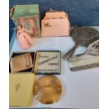 Vintage dressing table items to include a silver coloured brush set, 2 compacts and a mechanical