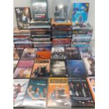 Over 80 music DVD's some as new to include Elvis, TRex, Red Hot Chilli Peppers, Tina Turner, The Who