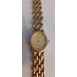 A ladies 9ct gold Accurist watch, total weight 15.3g, having a cream coloured dial Location: