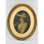 A Oval Gilt Framed Print of and Edwardian Girl, 46.5cm Wide