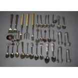 A Collection of Various Cutlery, Souvenir Spoons, Pickle Forks, Meat Fork, Sugar Tongs etc