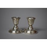 Two Silver Dwarf Candle Holders Both with Birmingham Hallmark, 26cm high, One with Dents to Silver