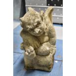 A Reconstituted Stone Gargoyle Garden Ornament, 25cm high