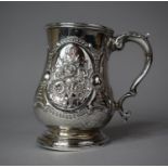 A Silver Tankard Decorated in Relief with Floral Garland and Monogrammed, London Hallmark 1864, (