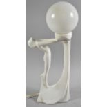 An Art Deco Style Table Lamp, Stylised Maiden Supporting Globular Glass Shade, 43cm high