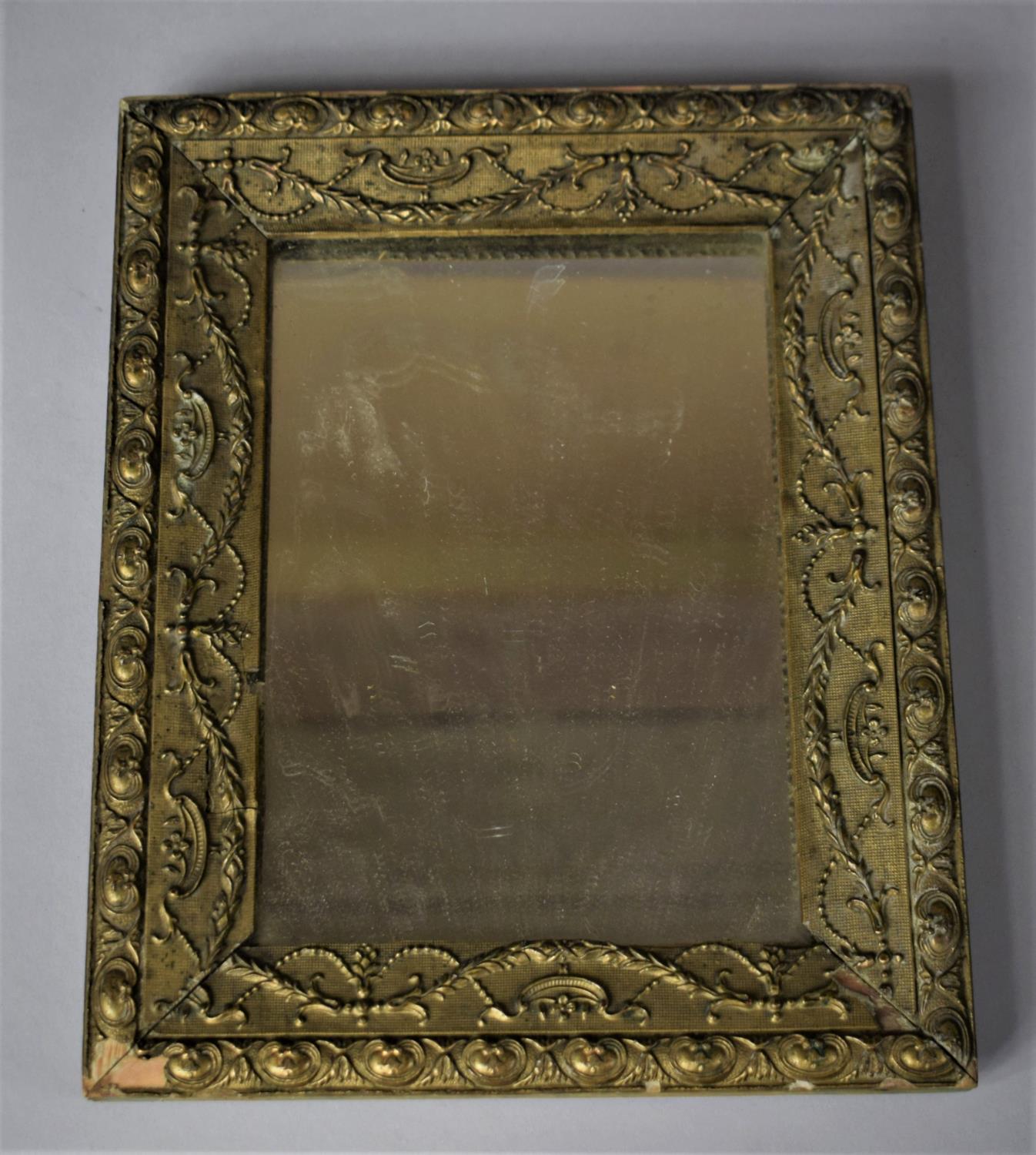 A Small 19th/Early 20th Century Rectangular Gilt Framed Mirror with Floral Swag Decoration in