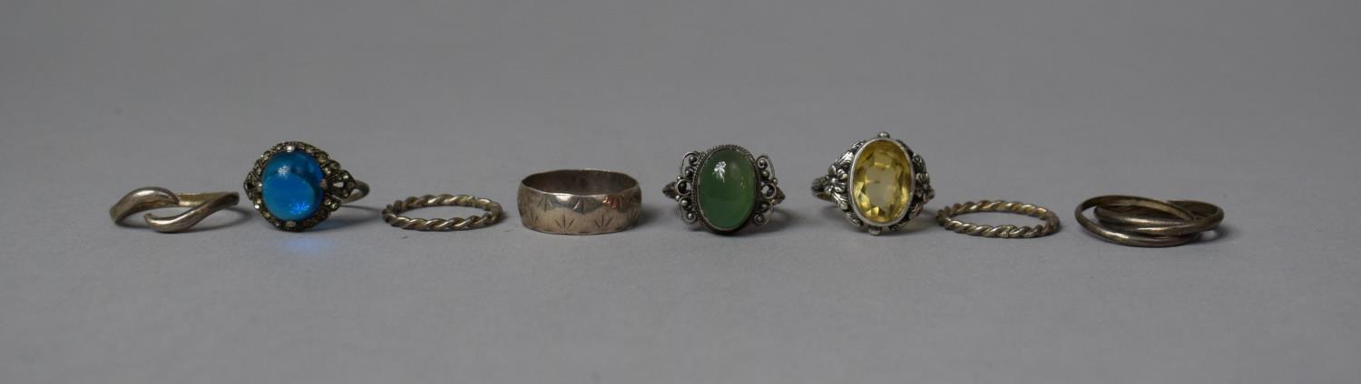 A Collection of Eight Silver Rings, Three Having Semi Precious Gems
