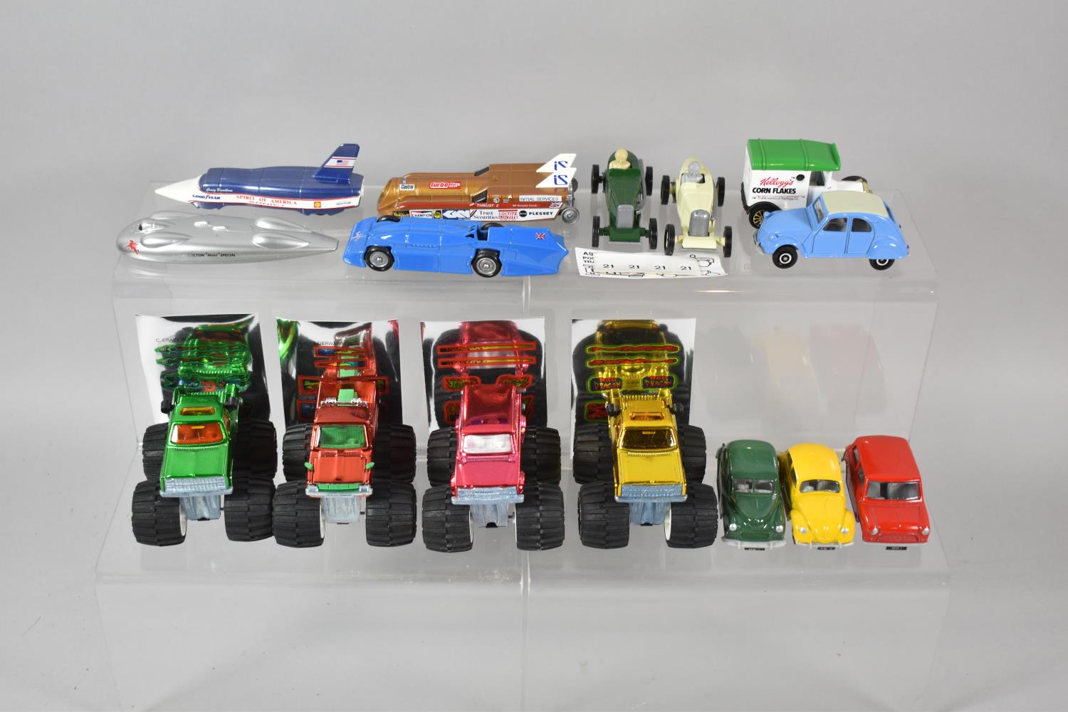 A Collection of Loose Diecast Vans, Cars and Monster Trucks to Include Corgi, Lledo etc