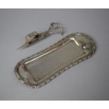 A Rectangular Silver Plated Snuffer Tray with Moulded Boarder Together with a Pair of Snuffer