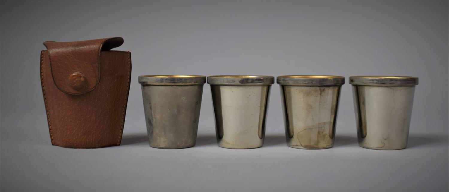 A Ogden of London Leather Cased Set of Four Cross Spirit/Toddy Cups, 7cm high Total, Cups 4.5cm High