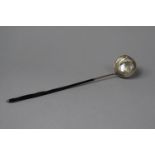 A Silver Toddy Ladle with Baleen Handle and Insert Queen Anne Silver Shilling 1711