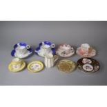 A Collection of Various Coalport Cabinet Cups and Saucers To Comprise Two Blue, Gilt and White