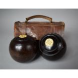 A Set of Two Early 20th Century Bowls Monogrammed HB in Leather Case (One strap AF)