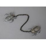 A Marcasite Spider Cloak/Cape Fastener Double Brooch Chain