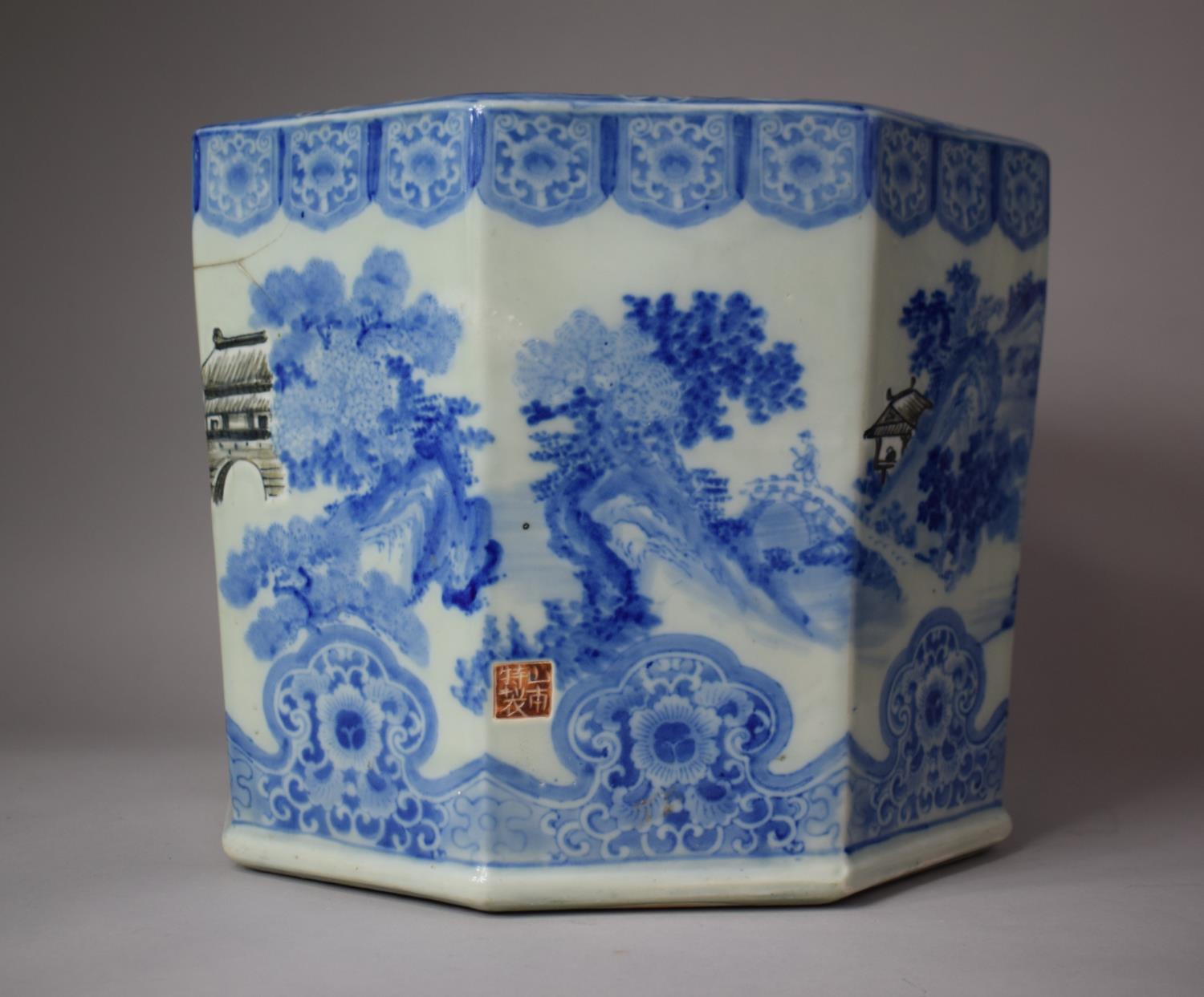 A Large Rectangular Blue and White Oriental Planter with Red Seal Mark to Side Panel, Crack and Loss