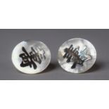 A Pair of Hong Kong Sterling Silver and Mother of Pearl Earrings. The Mother of Pearl Disks