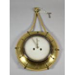 A Mid 20th Century Brass Wall Clock with Rope Hanging Surround, Eight Day Movement, 28cm Diameter