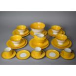 A Part Shelley's Yellow Teaset to Comprise Four Cup, Slop Bowl, Jug, Six Saucers, Six Side Plates