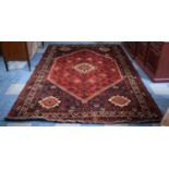 A Persian Pattern Rug on Red Ground, 313x211cm