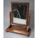 A 19th Century Mahogany Framed Dressing Table Mirror with Bun Feet, 56cms High