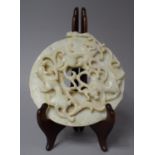 A Chinese Carved Hardstone Roundel Decorated in Relief with Crawling Lions and Verso with