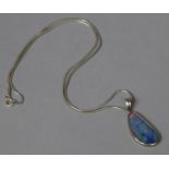A Pretty Ammolite or Opal Pendant on Silver Chain, Pendant 2.5x1.4cms