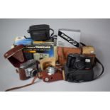A Collection of Various Cameras and Accessories to include Voigtlander, Boxed Cameras Etc