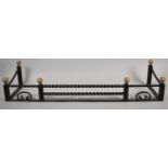 A Wrought Iron Fire Curb with Twisted Supports and Brass Ball Finials, 148cms Wide