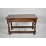 A Rectangular Oak Stool with Turned Wooden Supports, 72cms Wide