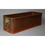 A Rectangular Copper Planter Having Lipped Edge and Brass Lion Mask Loop Handles, 42cms Wide