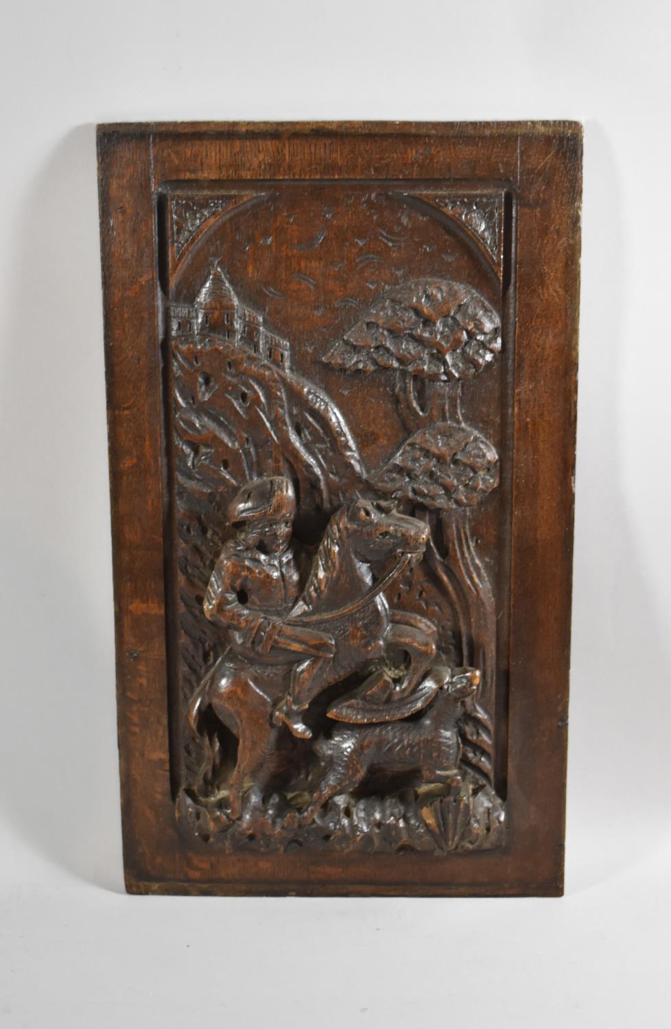 An Early Oak Carved Wooden Panel with Stag Hunt Decoration, 29.5cmsx51.5cms