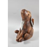 A Leather Effect Door Stop, in the Form of a Seated Hare, 33 cms High