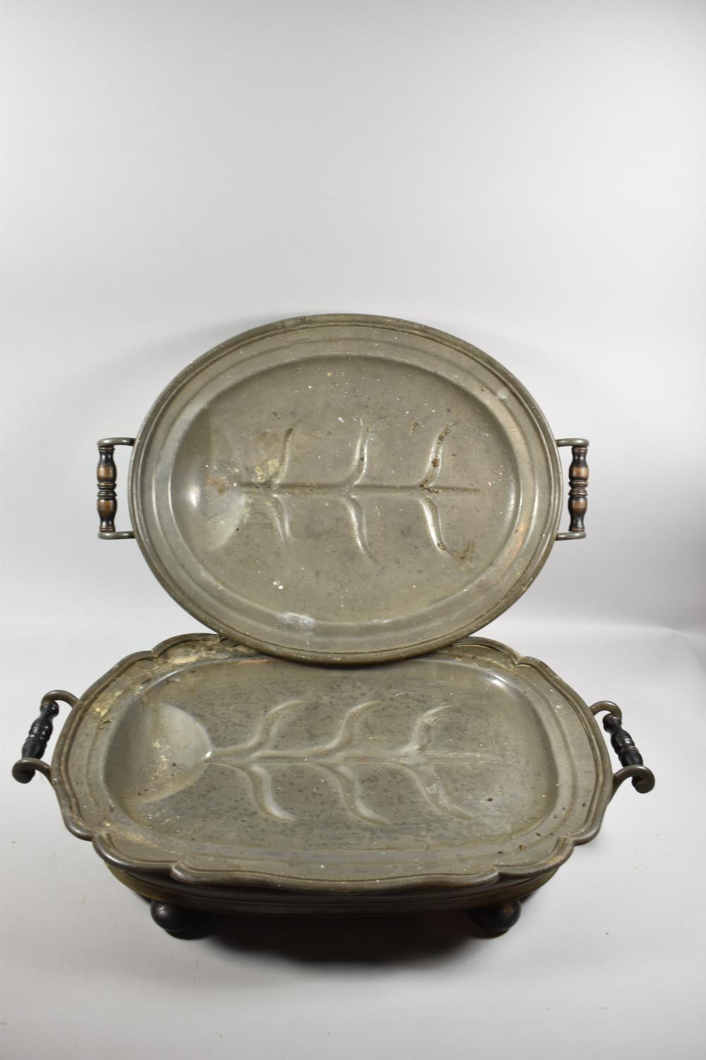 Two James Dixon & Sons Pewter Meat Warming Dishes with Wooden Bun Feet and Turned Wooden Handles,