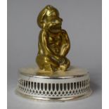 A Vintage Cast Brass Car Mascot in the Form of a Seated Baby on Later Mounted Silver Plated