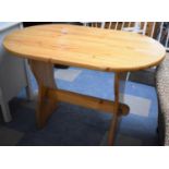A Pine Oval Topped Table, 107cms Wide
