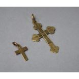 Two Gold Crucifix Pendants, Total Weight .7gms