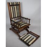 A Upholstered American Rocker Chair with Pull Out Footrest