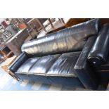 A Mid/Late 20th Century Black Leather Upholstered and Chrome Supported Three Seater Settee